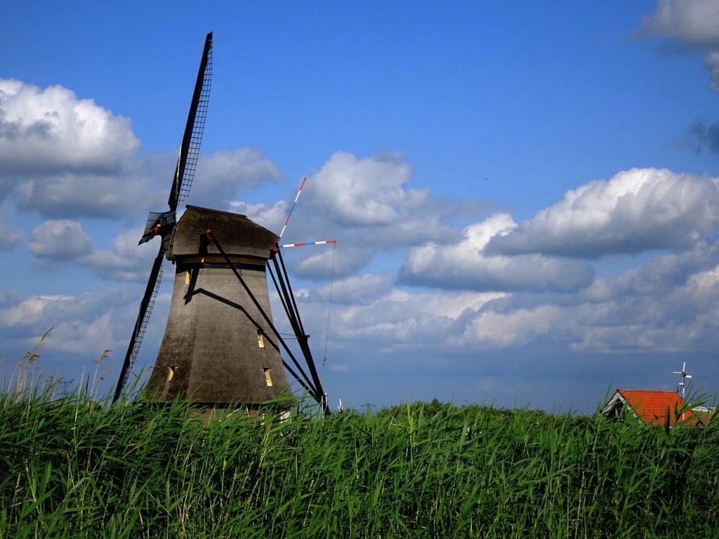 What makes Kinderdijk a unique tourist attraction in the Netherlands?