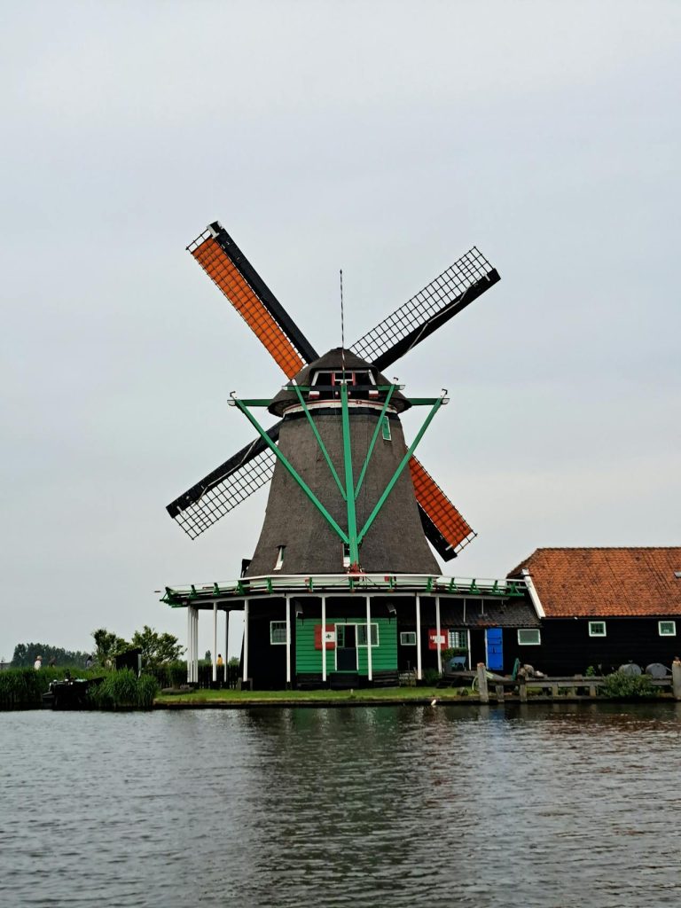 How can you explore the rich culture of Zaanse Schans?